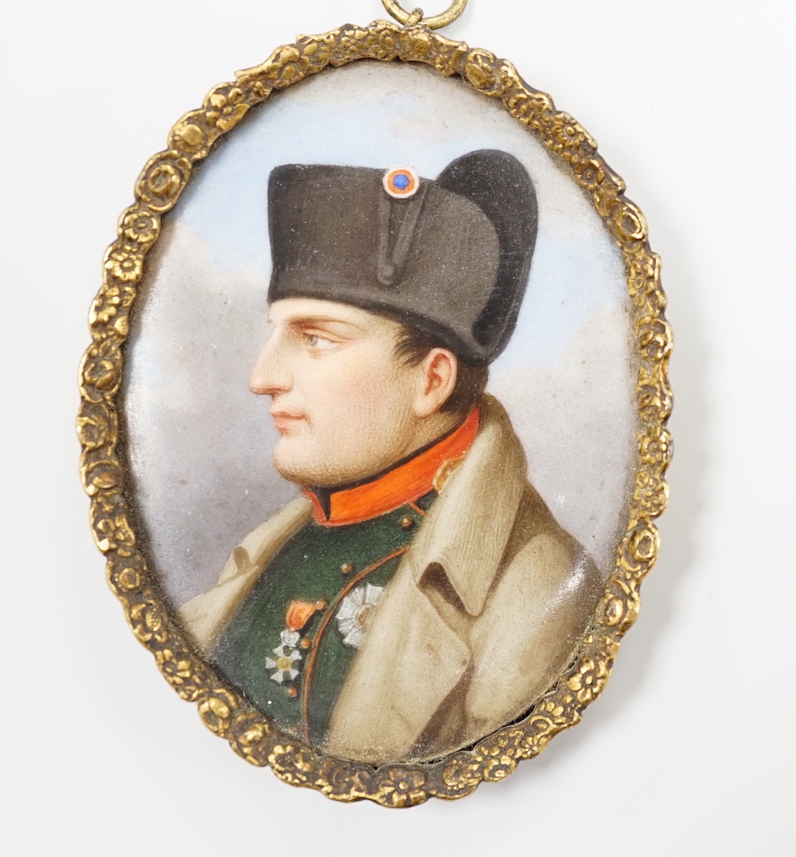A 19th century gilt framed portrait miniature of Napoleon, on porcelain, with box